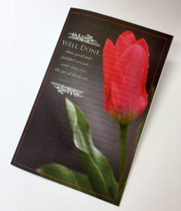 Scarlet tulip on the cover of Lucie Beauchemin's memorial card.